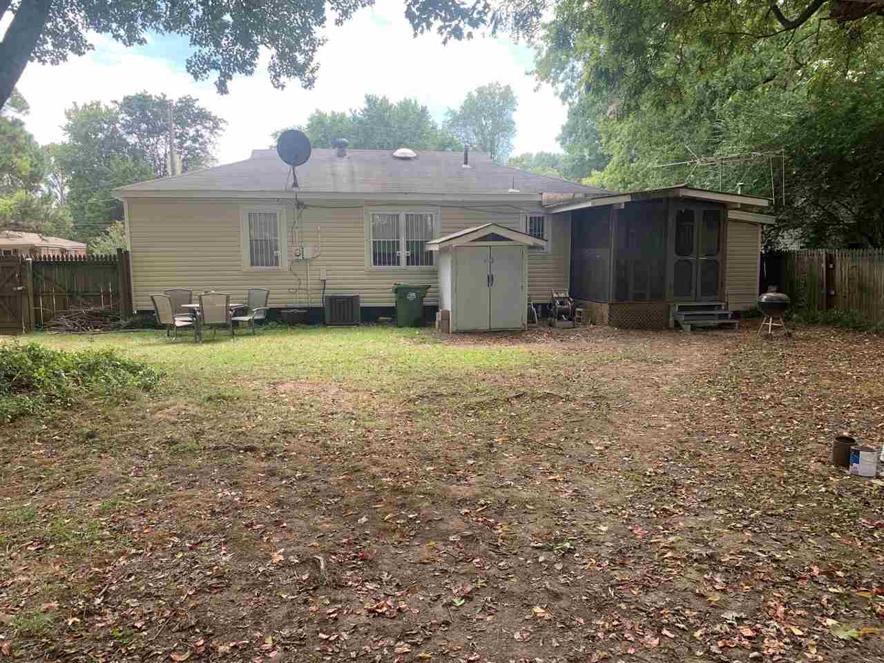 4588 Talley Road Millington, TN 38053 - Photo 15 of 17 a view of a house with backyard and trees