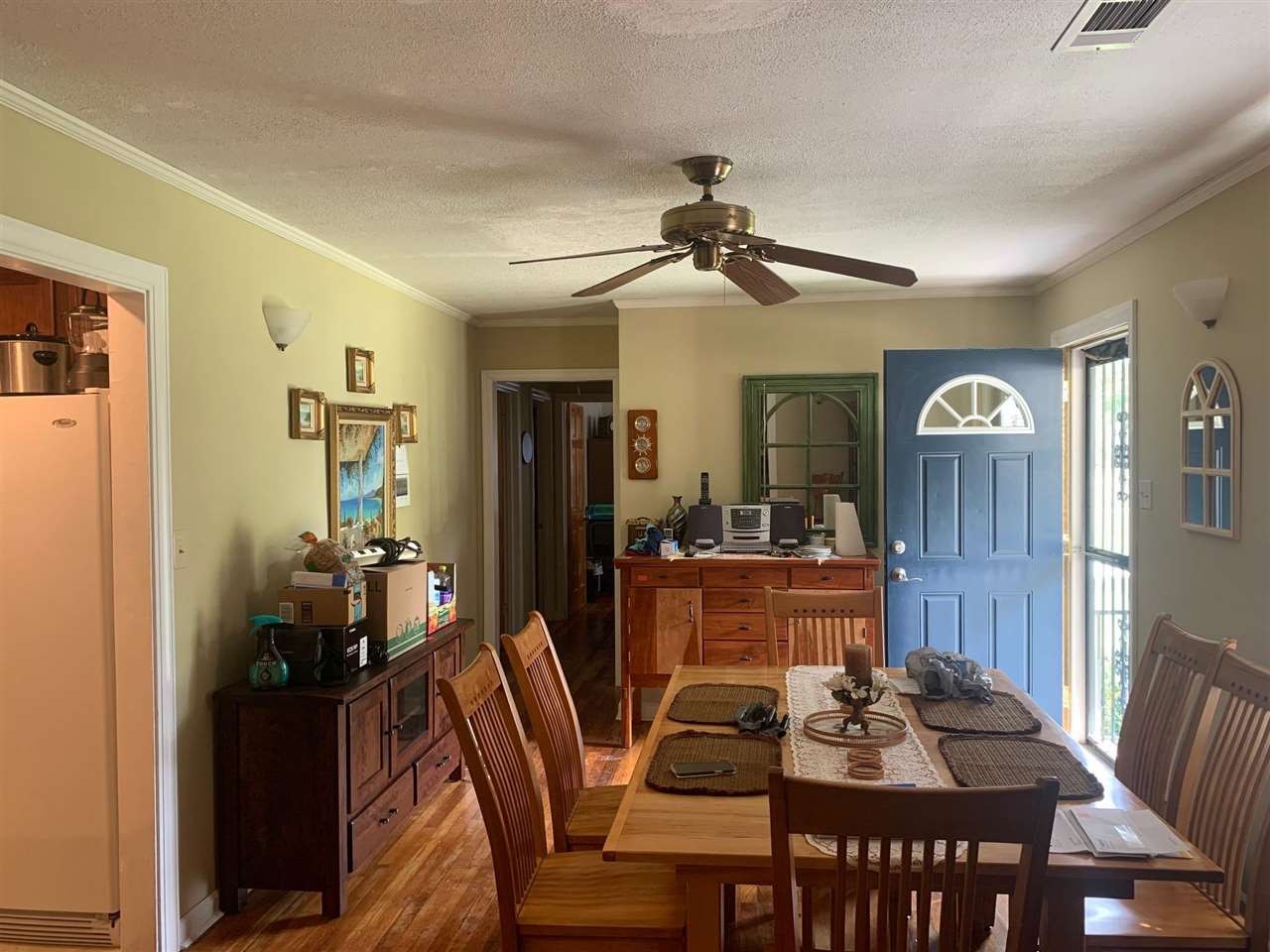 4588 Talley Road Millington, TN 38053 - Photo 3 of 17 a view of a dining room with furniture window and wooden floor