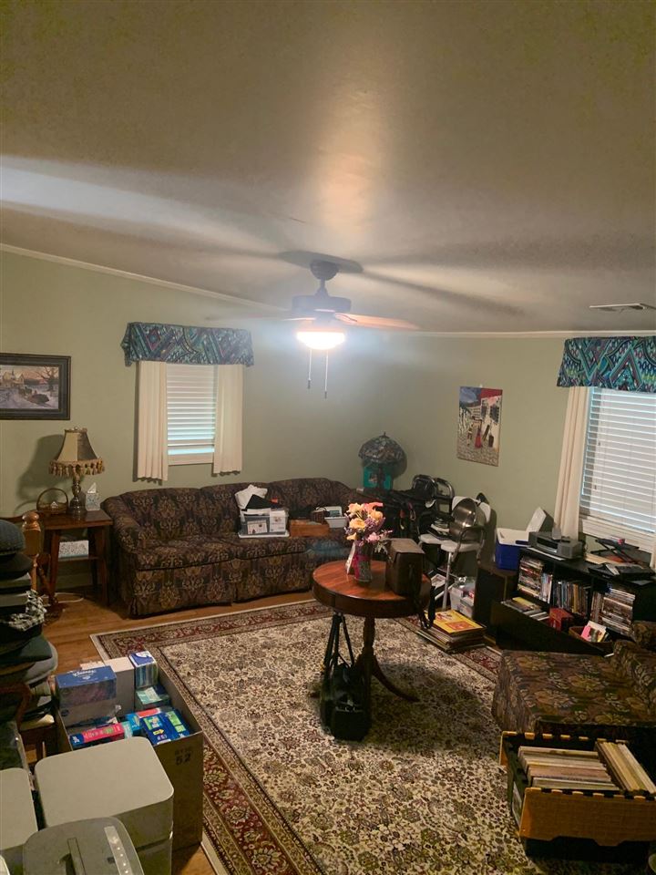 4588 Talley Road Millington, TN 38053 - Photo 4 of 17 a living room with furniture and a wooden floor