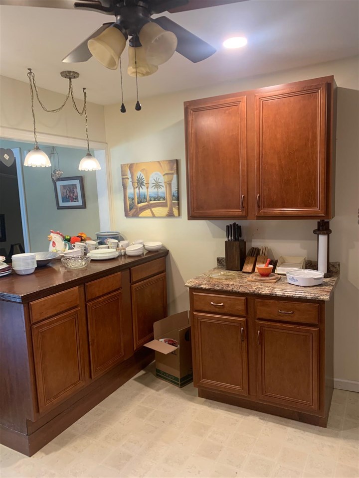 4588 Talley Road Millington, TN 38053 - Photo 7 of 17 a kitchen with a sink cabinets and window