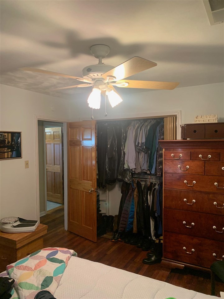 4588 Talley Road Millington, TN 38053 - Photo 9 of 17 a bedroom with a bed and a mirror