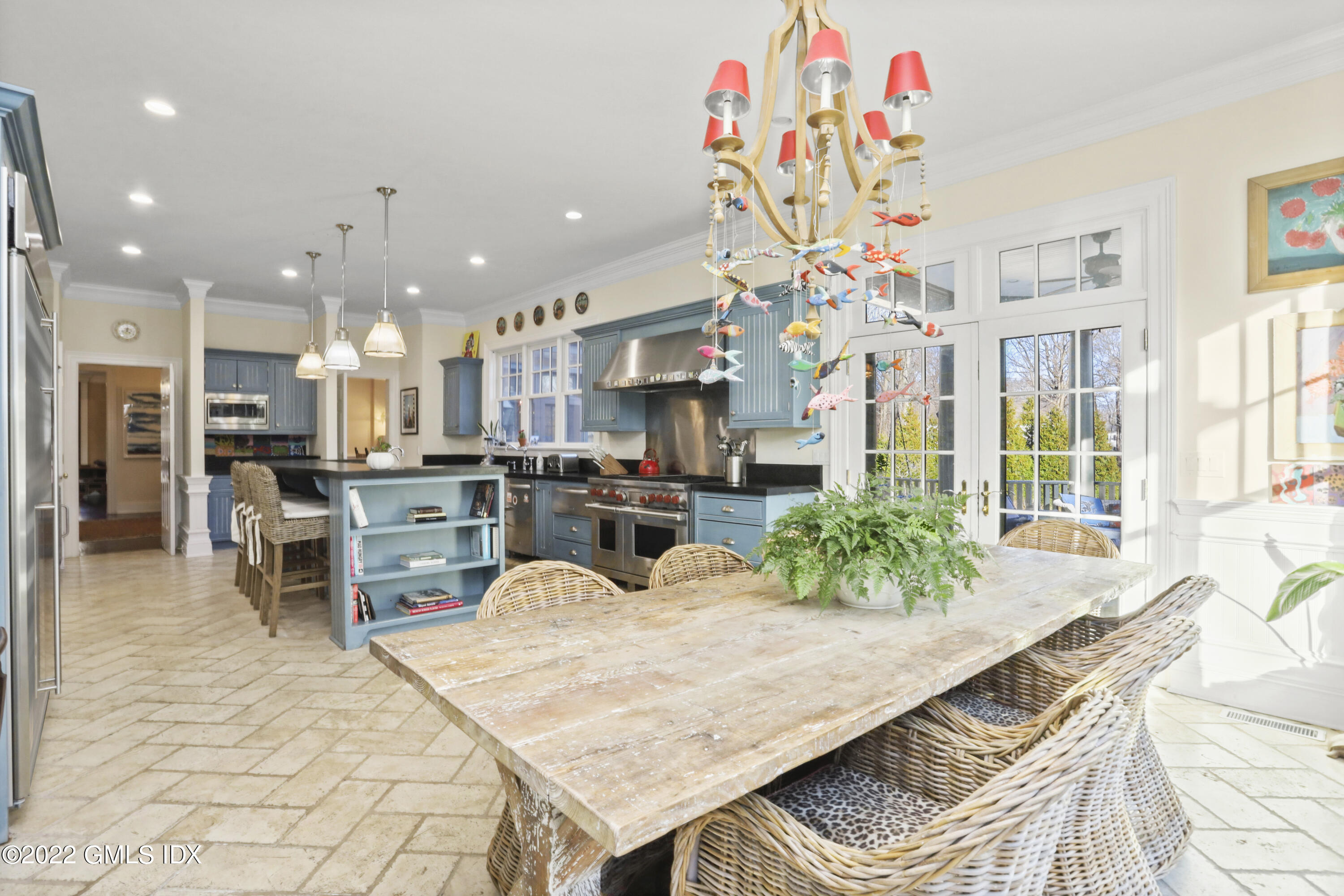 59 Cat Rock Road Cos Cob, CT 06807 - Photo 13 of 51 a living room with granite countertop kitchen island stainless steel appliances furniture a chandelier and a kitchen view