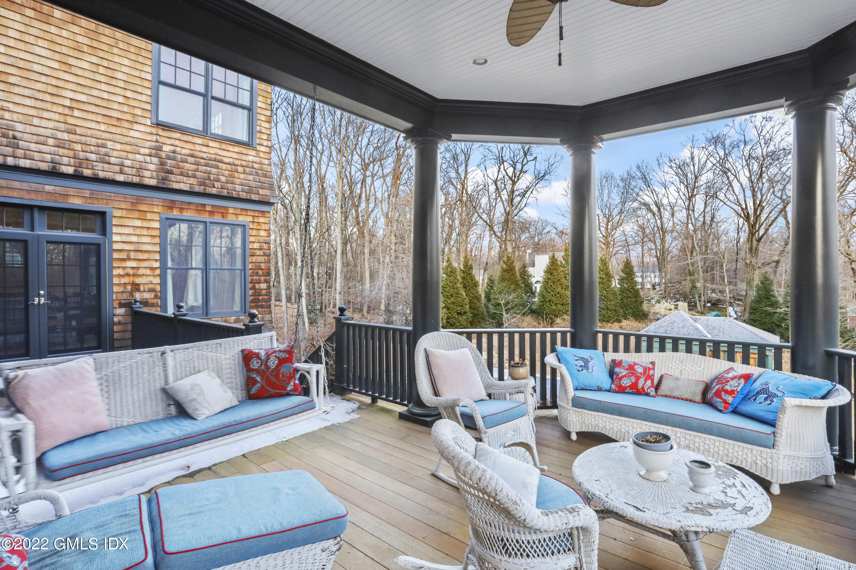 59 Cat Rock Road Cos Cob, CT 06807 - Photo 16 of 51 a living room with furniture and a large window