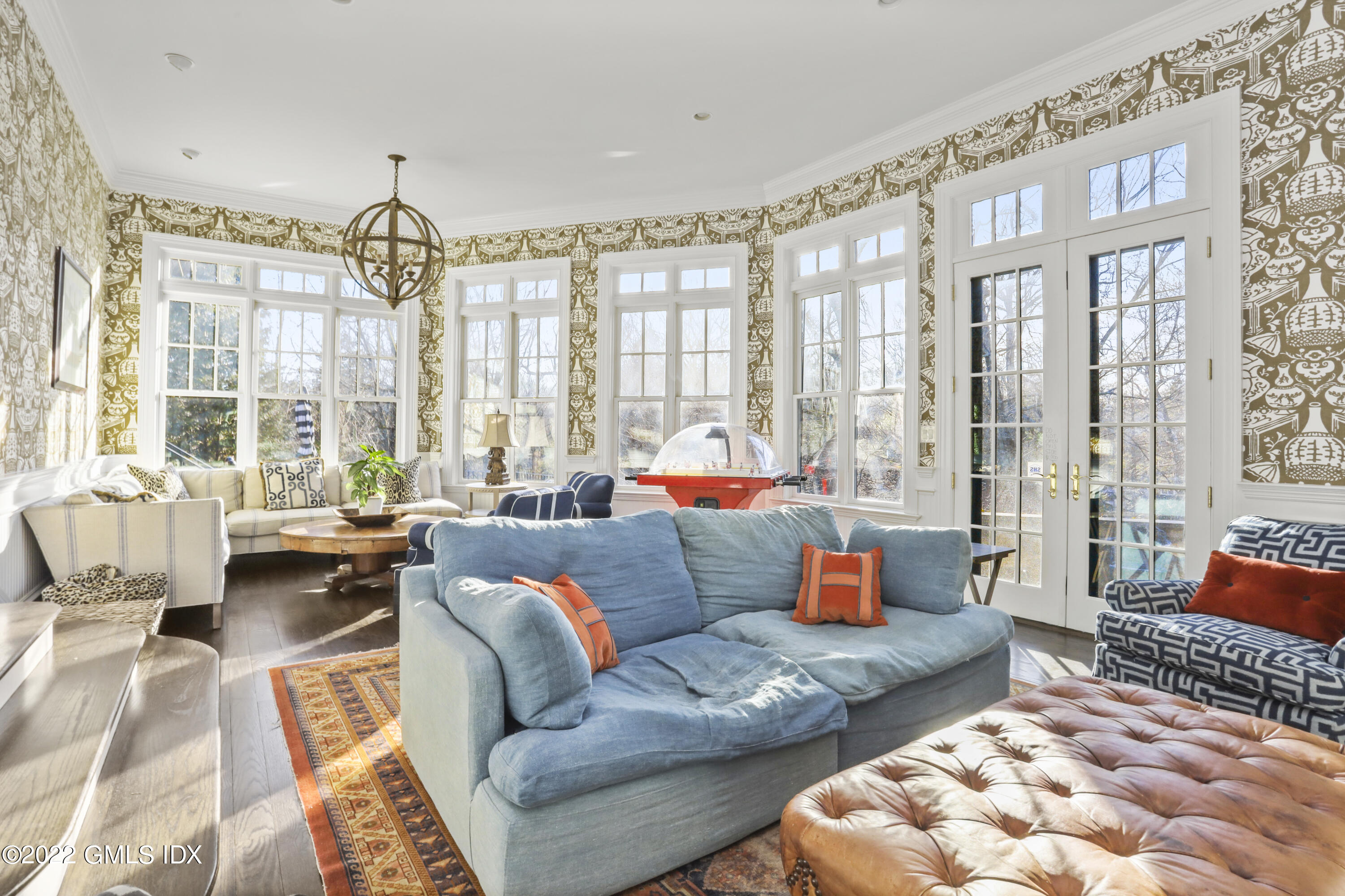 59 Cat Rock Road Cos Cob, CT 06807 - Photo 18 of 51 a living room with furniture and a large window