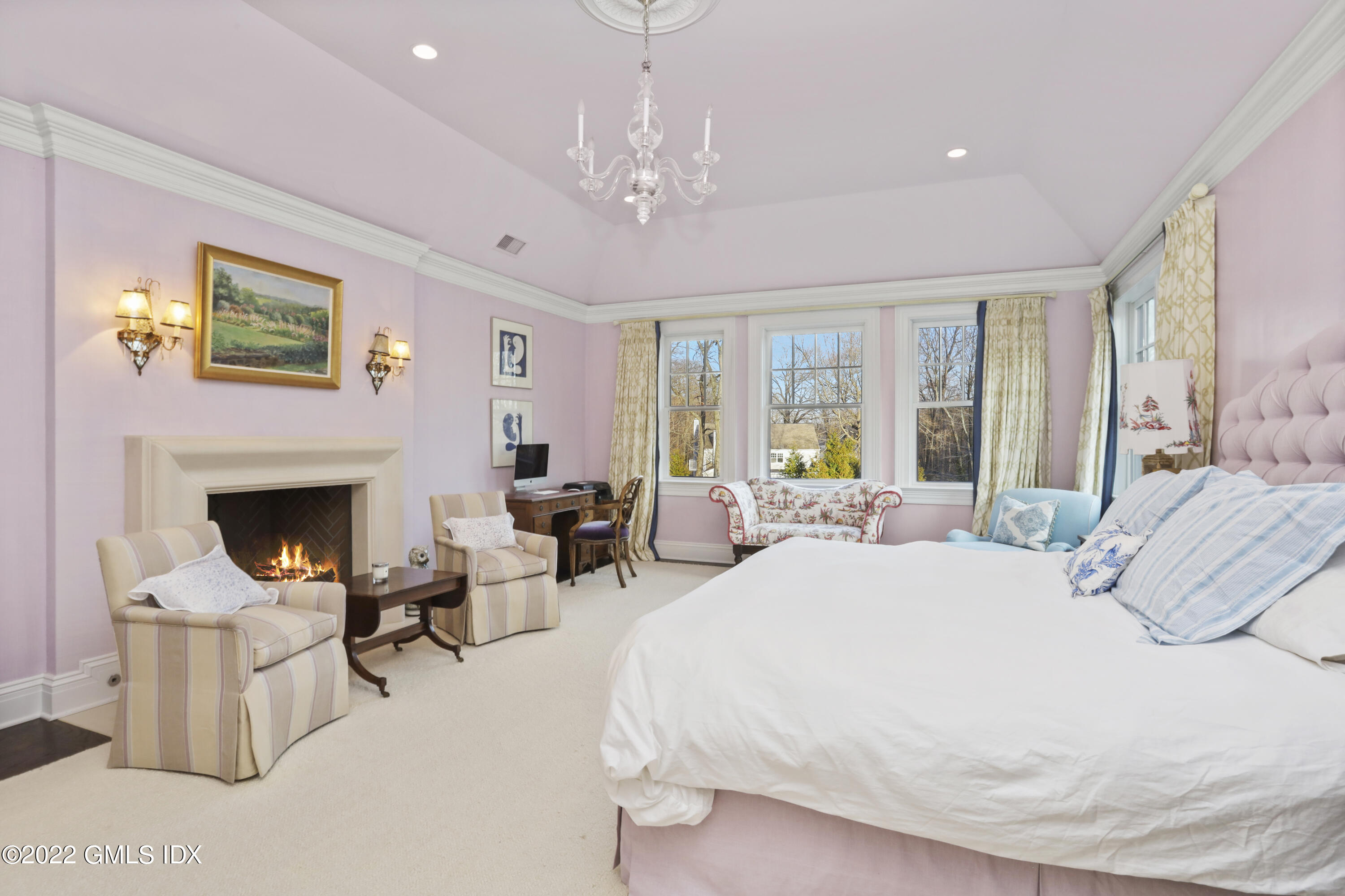 59 Cat Rock Road Cos Cob, CT 06807 - Photo 21 of 51 a spacious bedroom with furniture and a fireplace