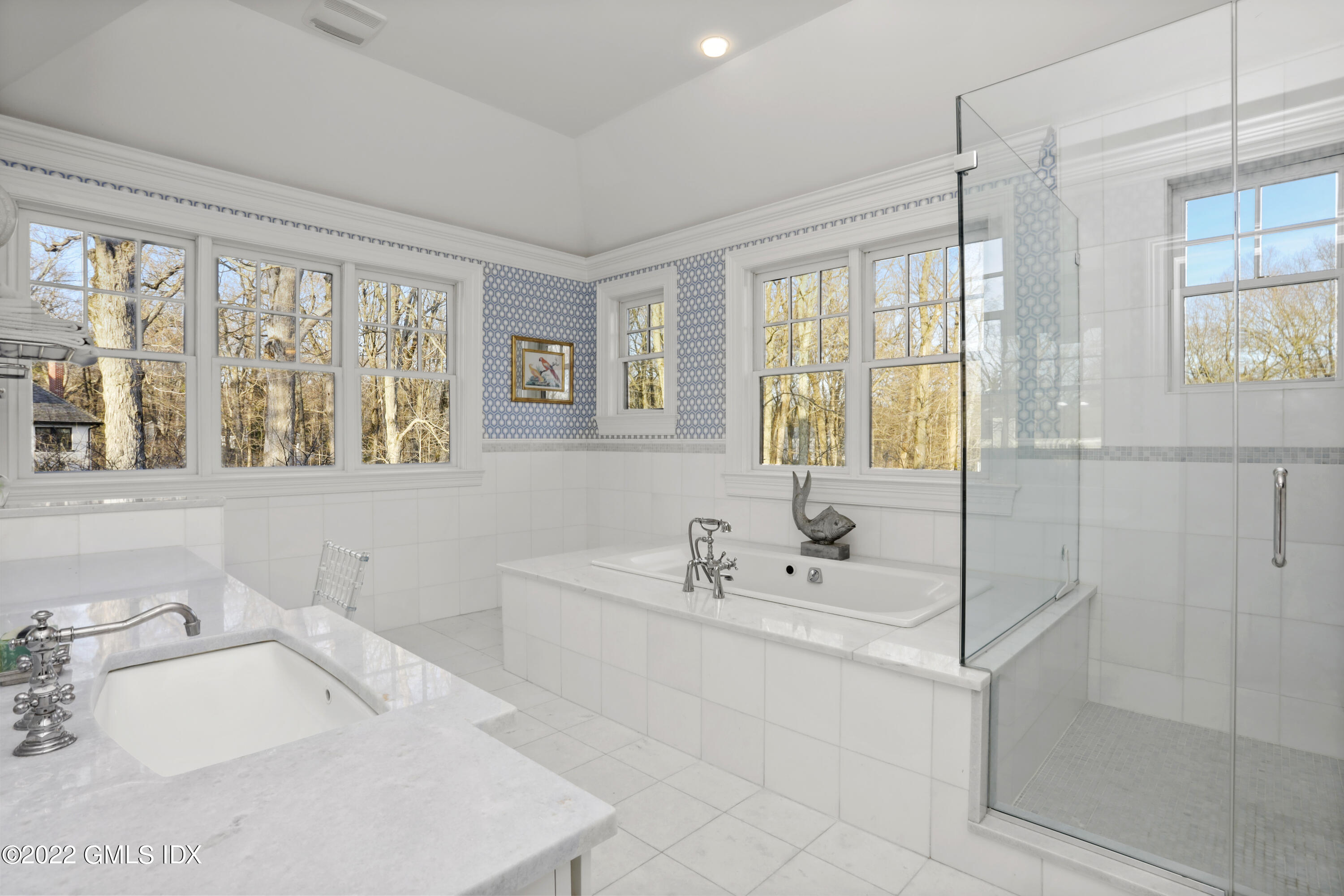 59 Cat Rock Road Cos Cob, CT 06807 - Photo 23 of 51 a bathroom with a tub sink and mirror