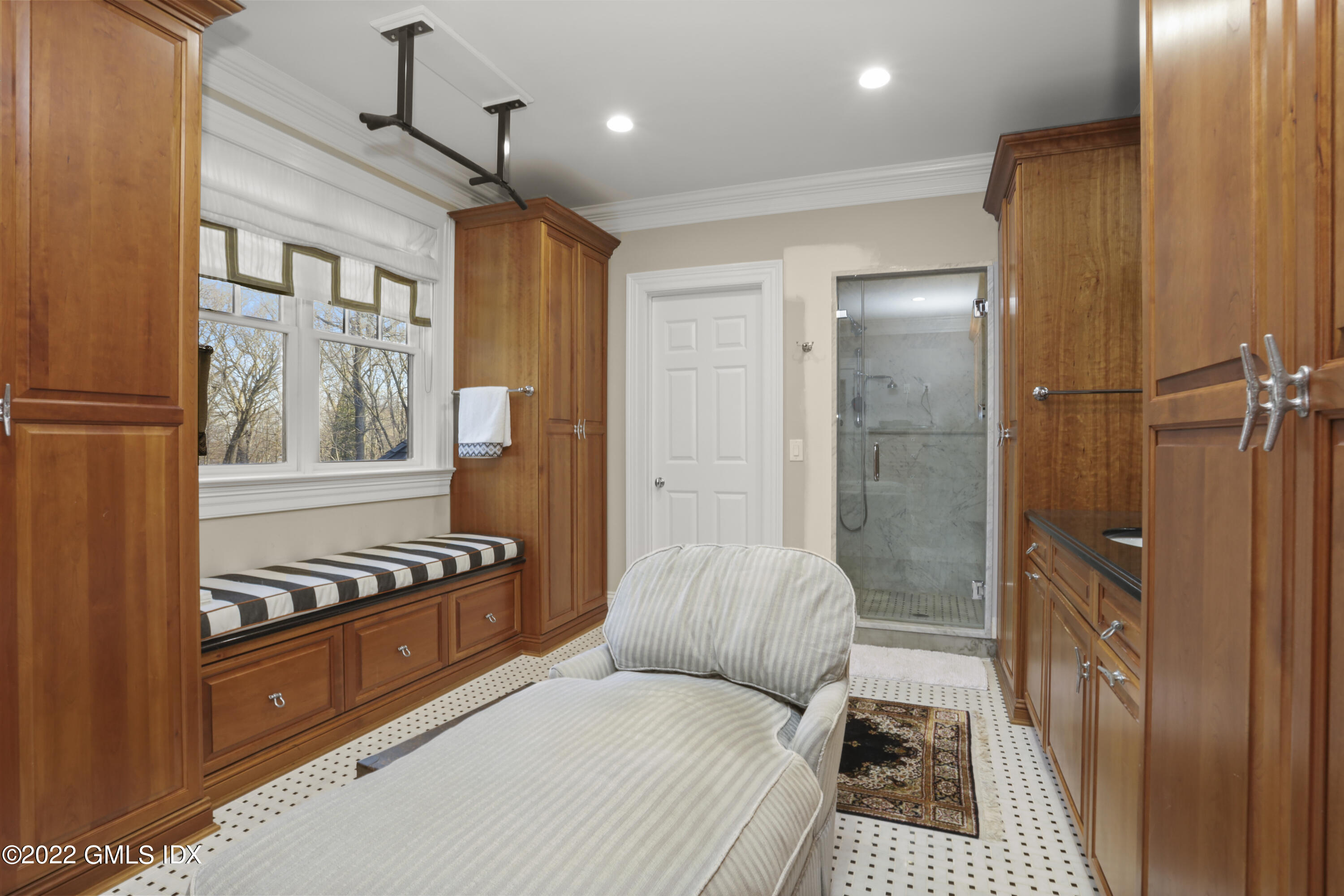 59 Cat Rock Road Cos Cob, CT 06807 - Photo 25 of 51 a bedroom with a bed and a dresser