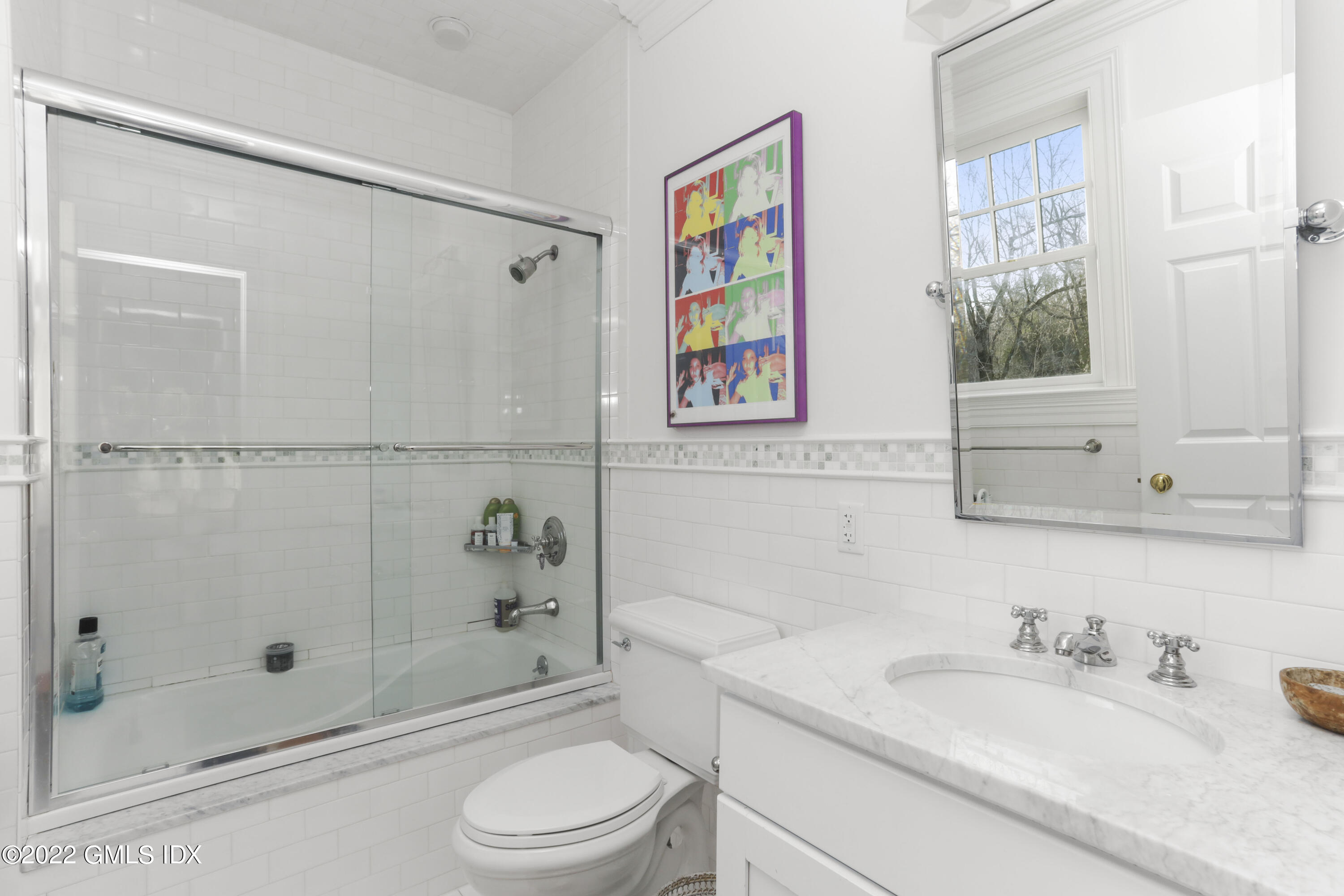 59 Cat Rock Road Cos Cob, CT 06807 - Photo 30 of 51 a bathroom with a sink a toilet and shower