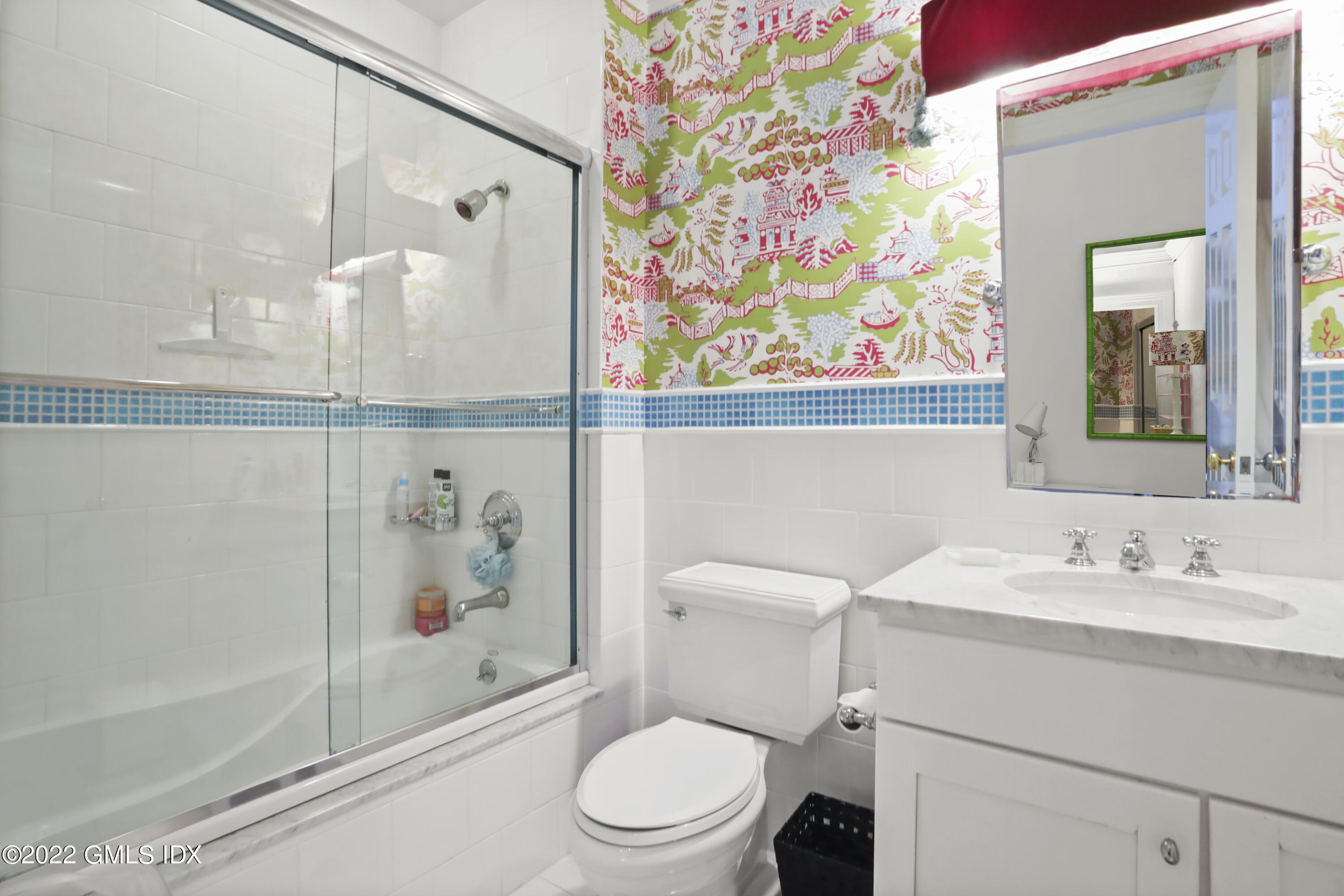 59 Cat Rock Road Cos Cob, CT 06807 - Photo 32 of 51 a bathroom with a sink a toilet and shower