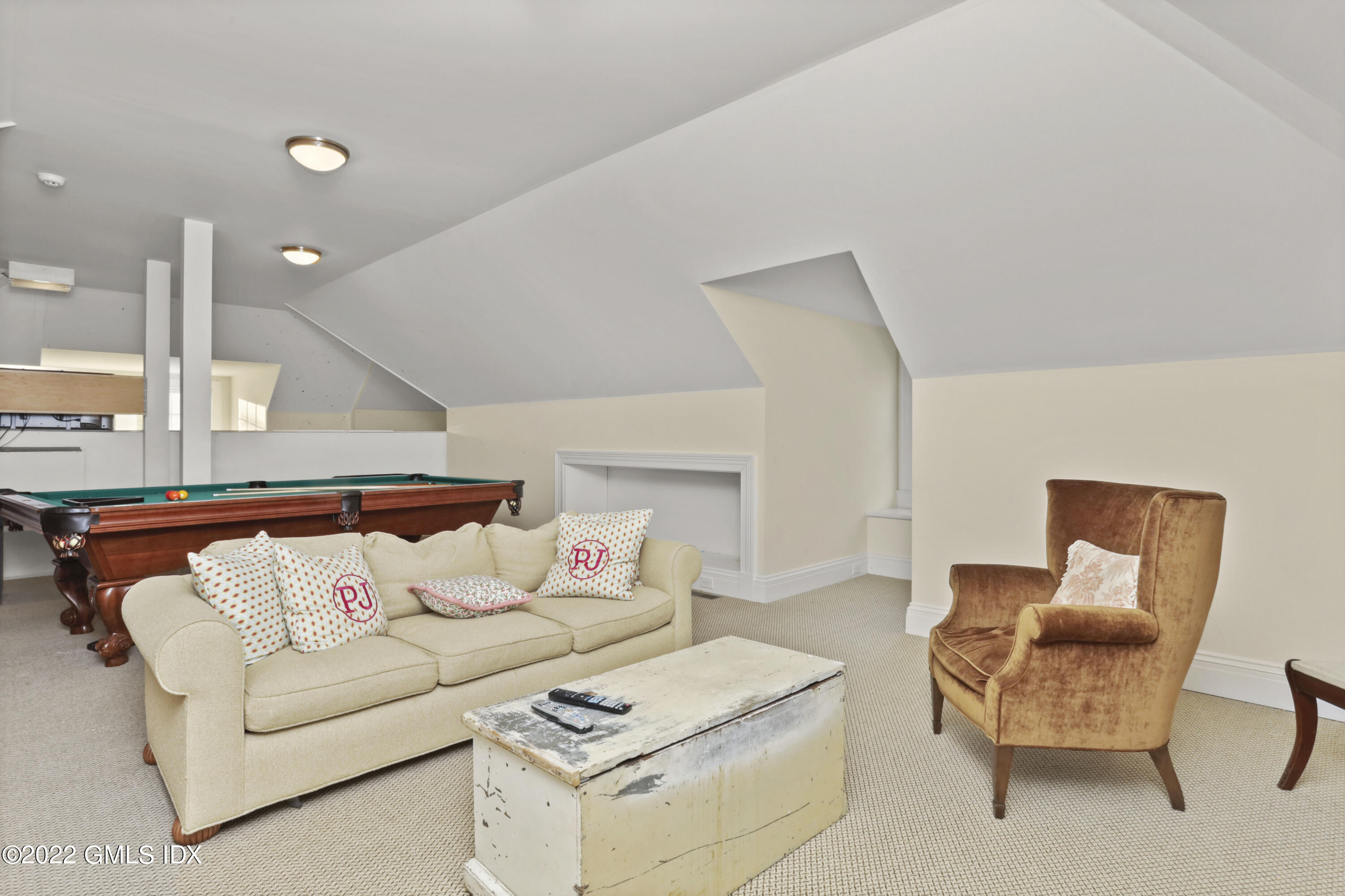 59 Cat Rock Road Cos Cob, CT 06807 - Photo 35 of 51 a living room with furniture and a couch