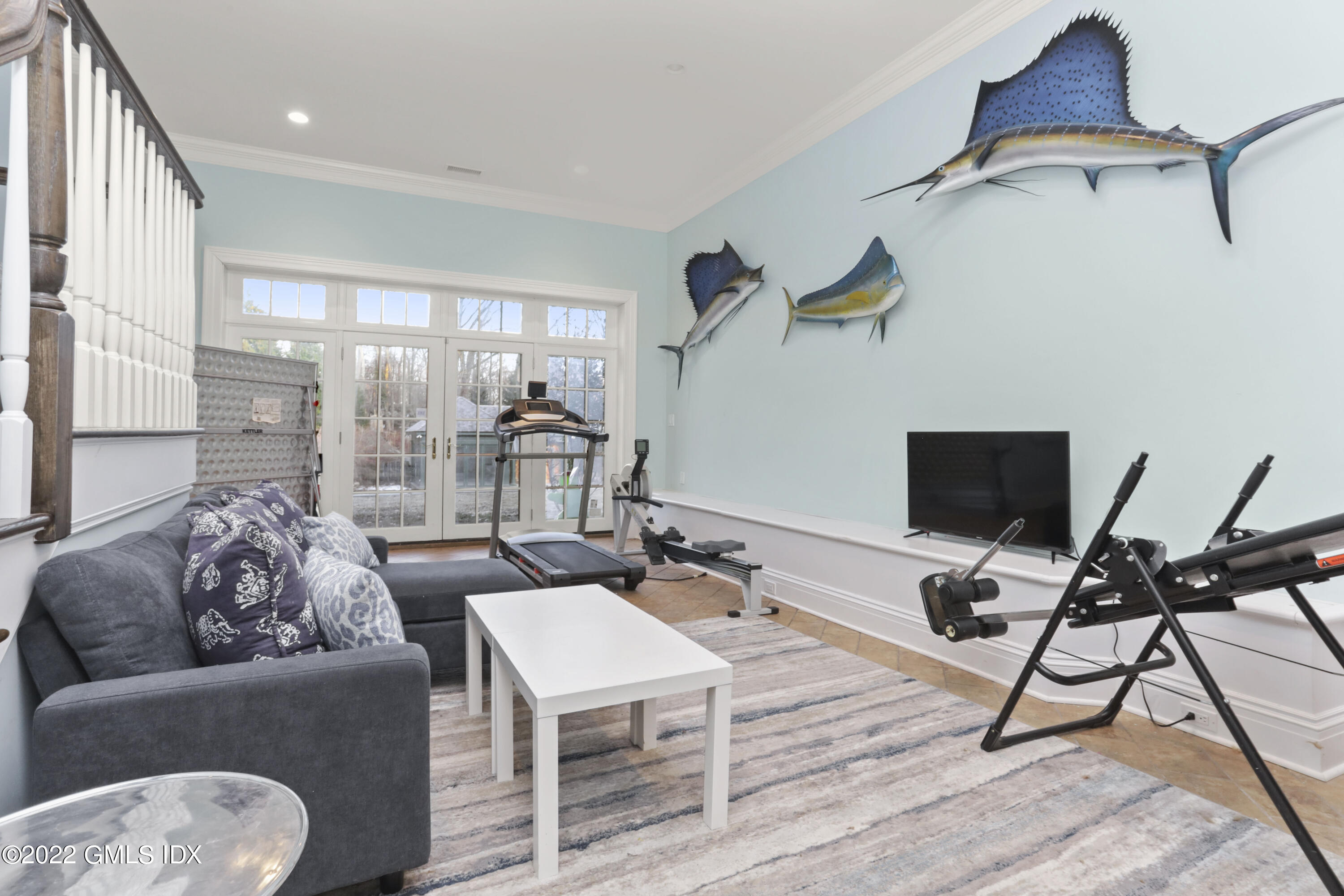 59 Cat Rock Road Cos Cob, CT 06807 - Photo 38 of 51 a work room with furniture and a wooden floor
