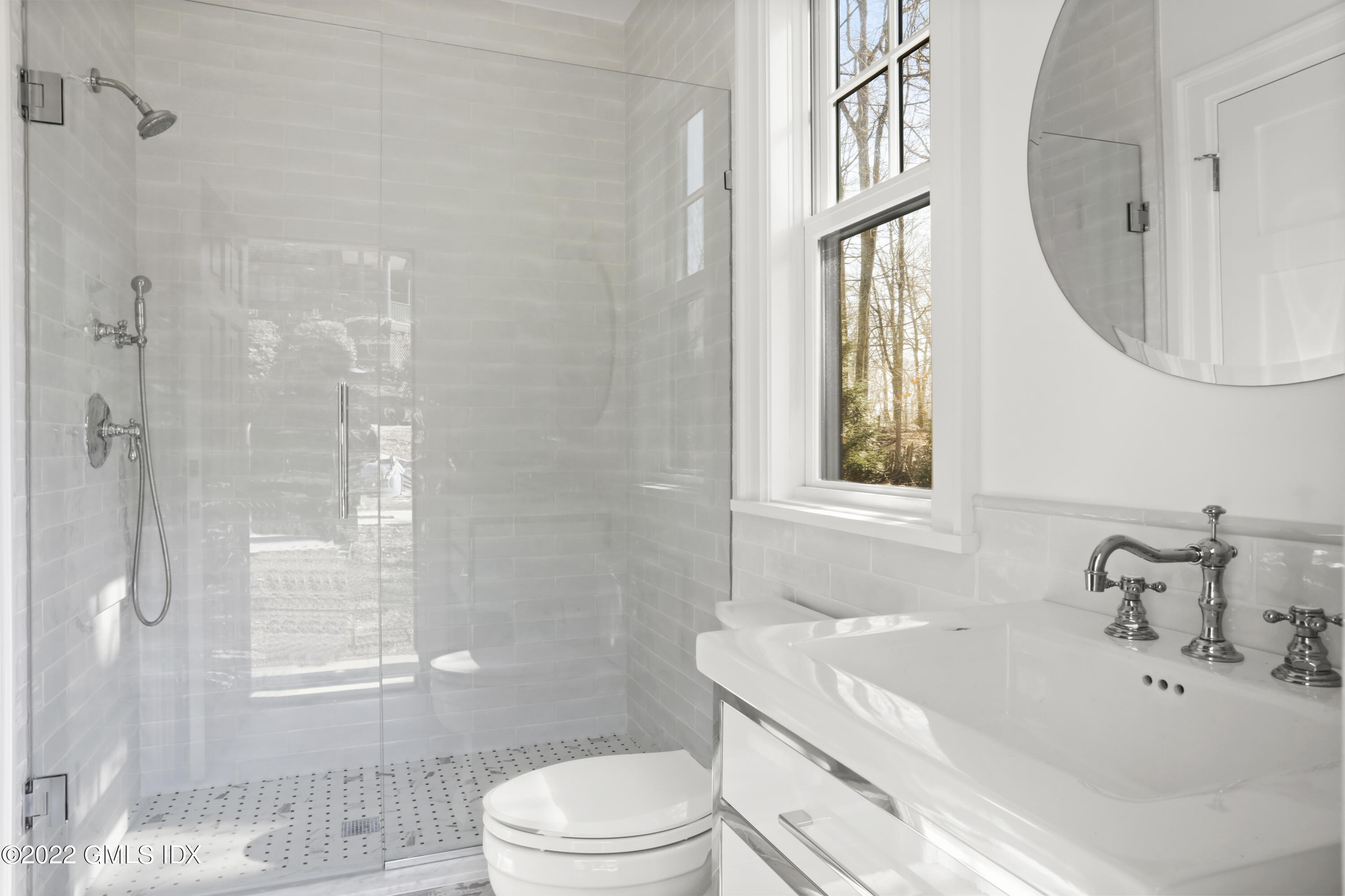 59 Cat Rock Road Cos Cob, CT 06807 - Photo 48 of 51 a bathroom with a sink a toilet and shower