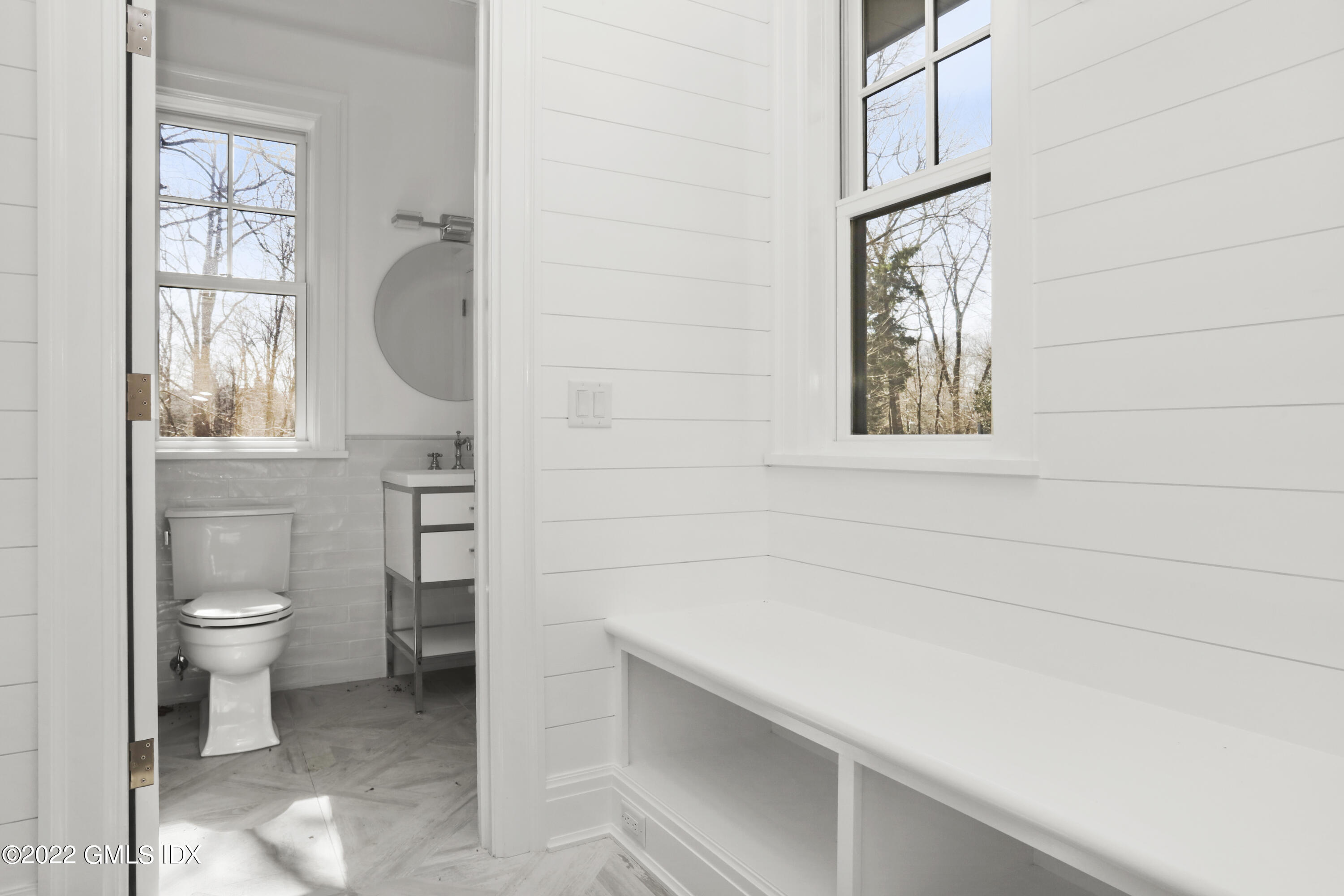 59 Cat Rock Road Cos Cob, CT 06807 - Photo 49 of 51 a bathroom with a toilet a sink and a bathtub