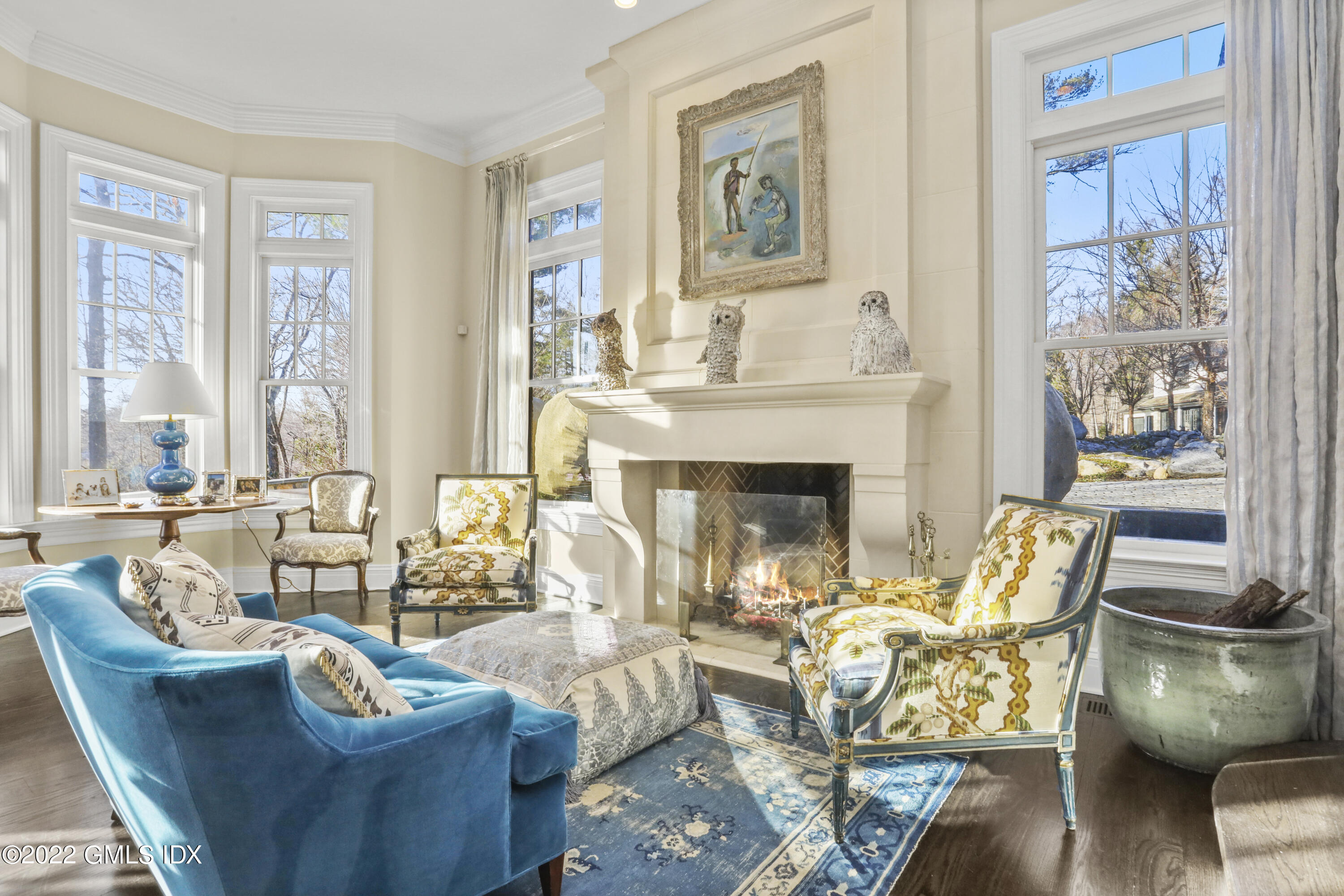 59 Cat Rock Road Cos Cob, CT 06807 - Photo 5 of 51 a living room with fireplace furniture and floor to ceiling windows