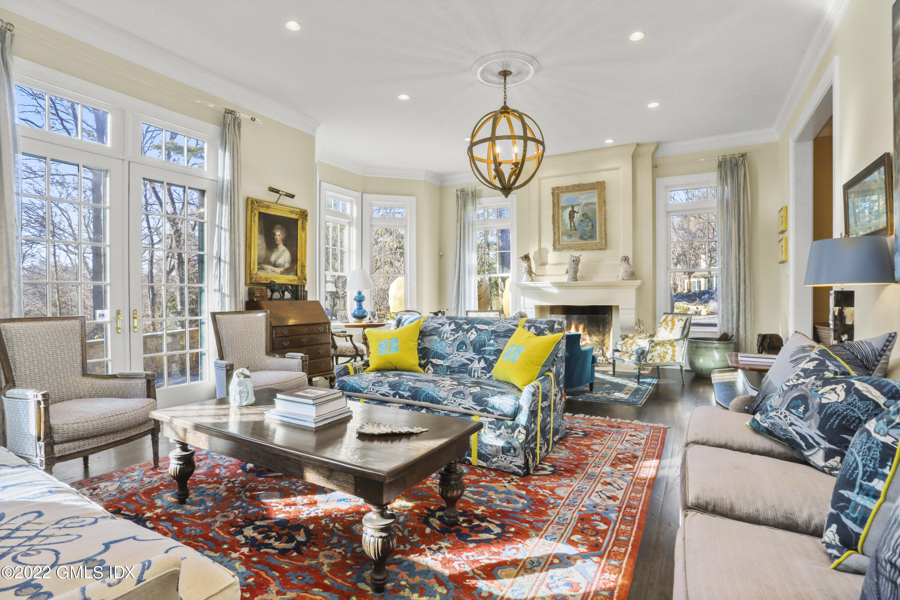 59 Cat Rock Road Cos Cob, CT 06807 - Photo 6 of 51 a living room with fireplace furniture and a large window