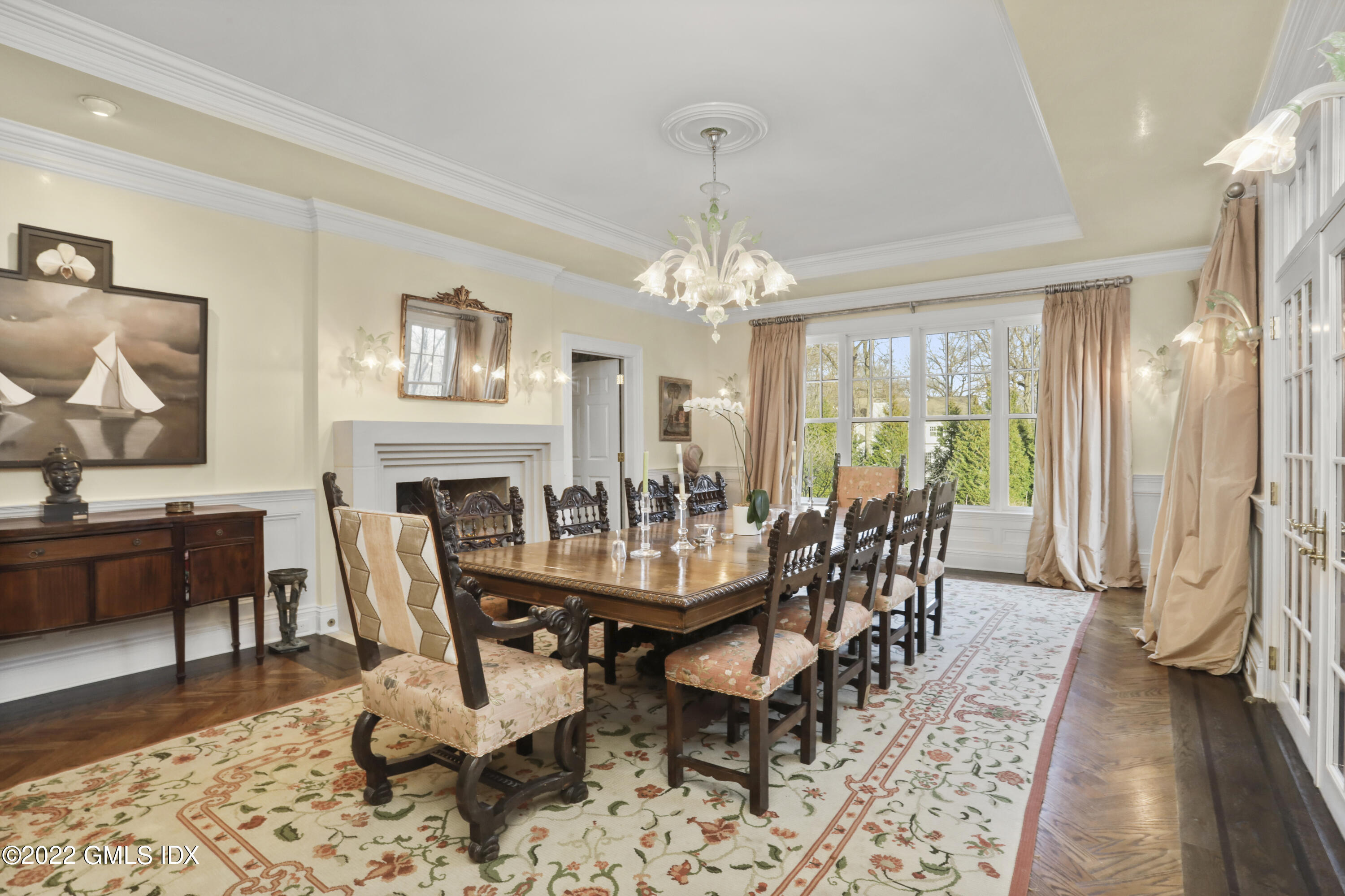 59 Cat Rock Road Cos Cob, CT 06807 - Photo 10 of 51 a view of a dining room with furniture window and wooden floor