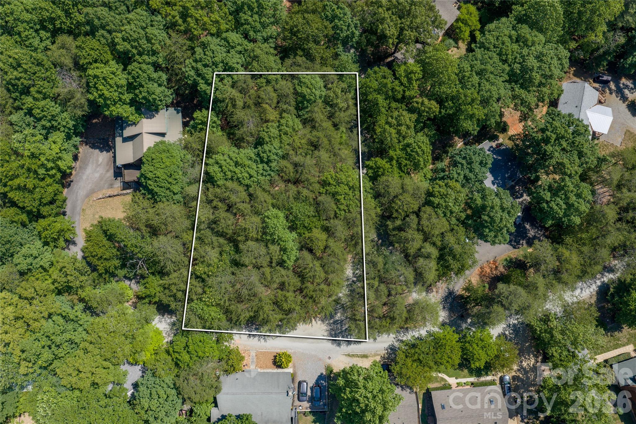 0 View Trail Lake Lure, NC 28746 - Photo 1 of 11 an aerial view of a house with a yard