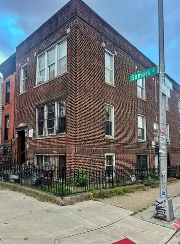 a front view of a building with street