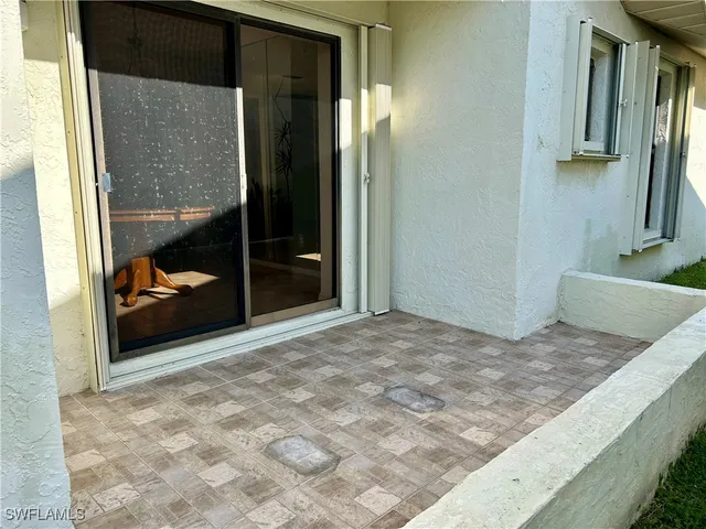 a bedroom with a bed and walk in closet
