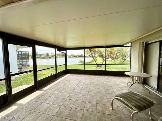 a view of a balcony with wooden floor