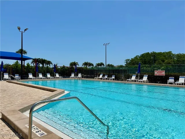 a view of a house with a swimming pool