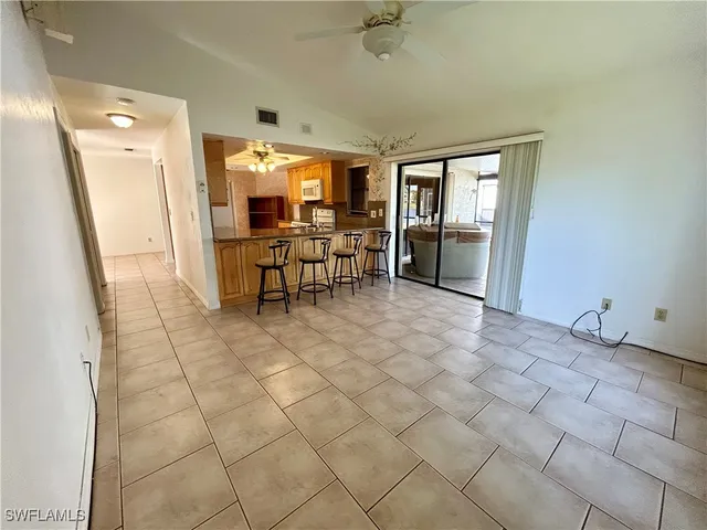 a view of a livingroom with furniture and window