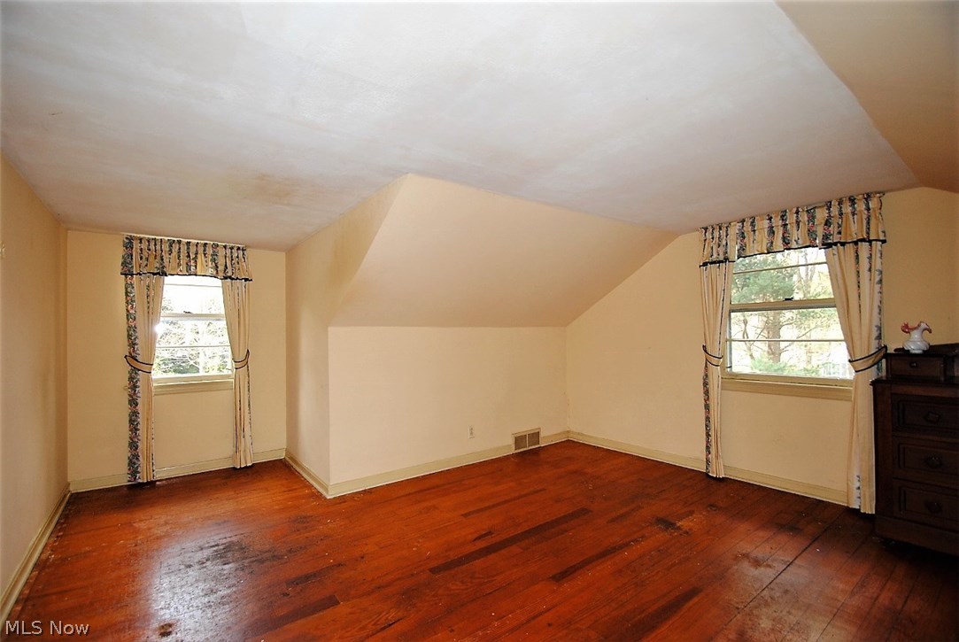 569 Solon Road Chagrin Falls, OH 44022 - Photo 15 of 21 LARGE SECOND FLOOR BEDROOM WITH WALK IN CLOSET AND WOOD FLOORING