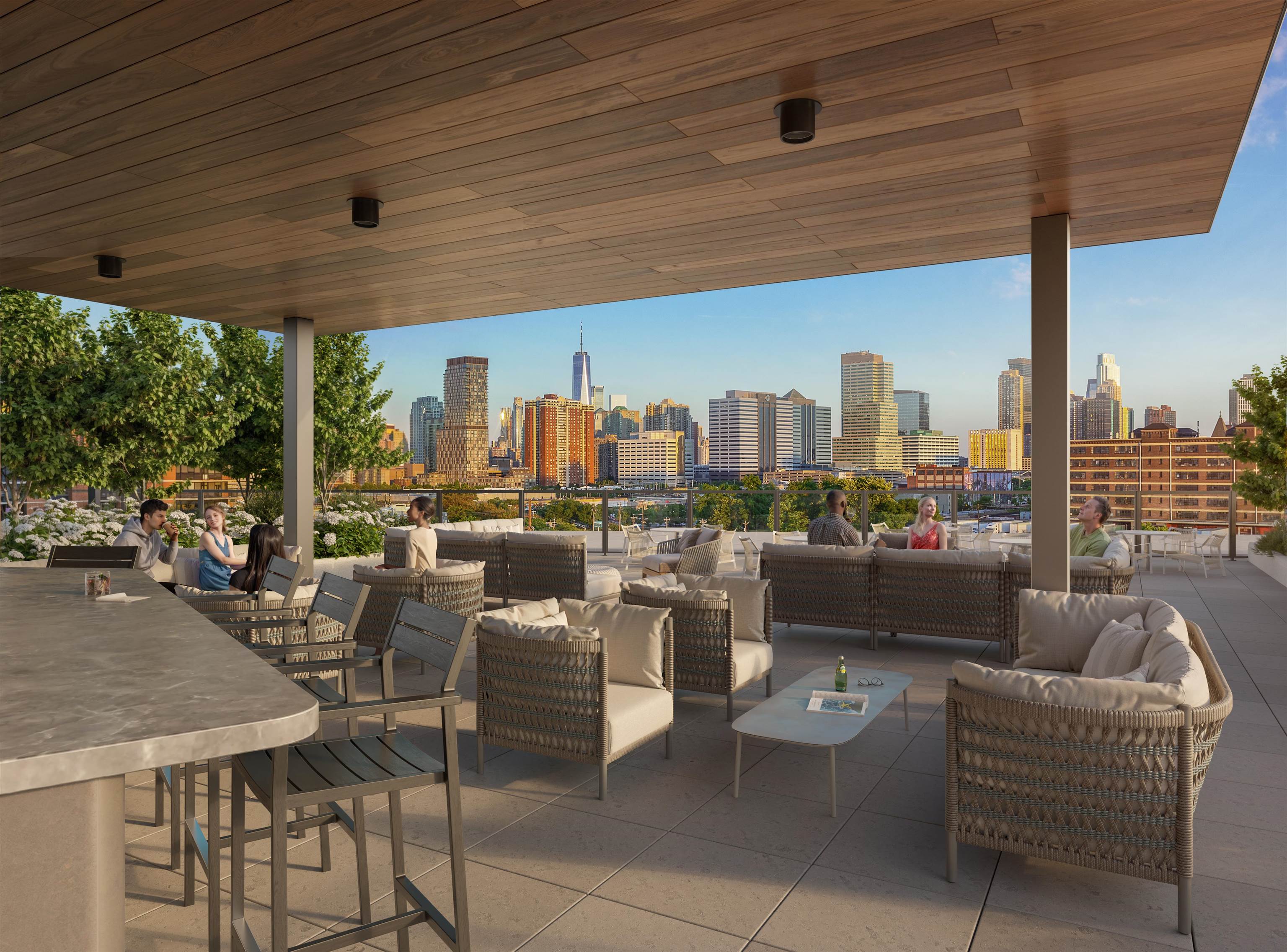 38 Jackson Street, Unit 705 Hoboken, NJ 07030 - Photo 5 of 15 a roof deck with couches and potted plants
