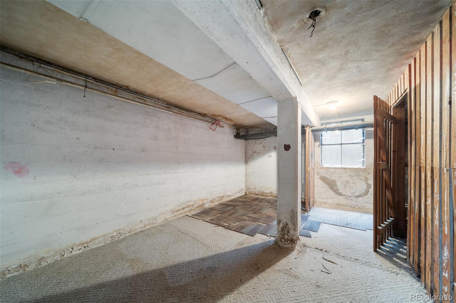 1456 Galena Street Aurora, CO 80010 - Photo 25 of 34 a view of a hallway