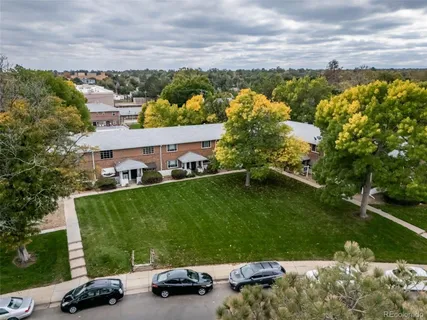 an aerial view of a house with a garden