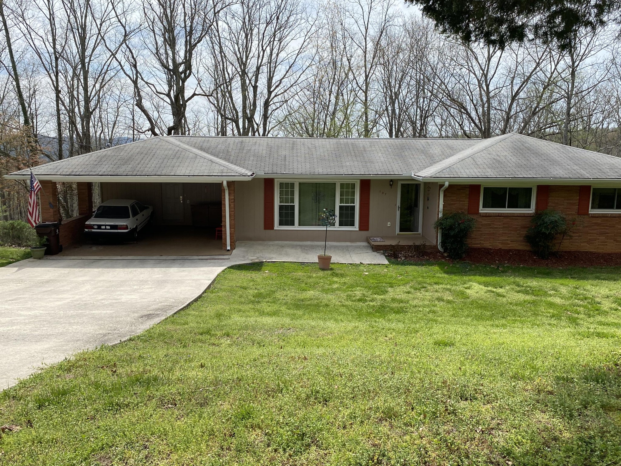 107 Morgan Road Oak Ridge, TN 37830 - Photo 1 of 24 a front view of a house with garden
