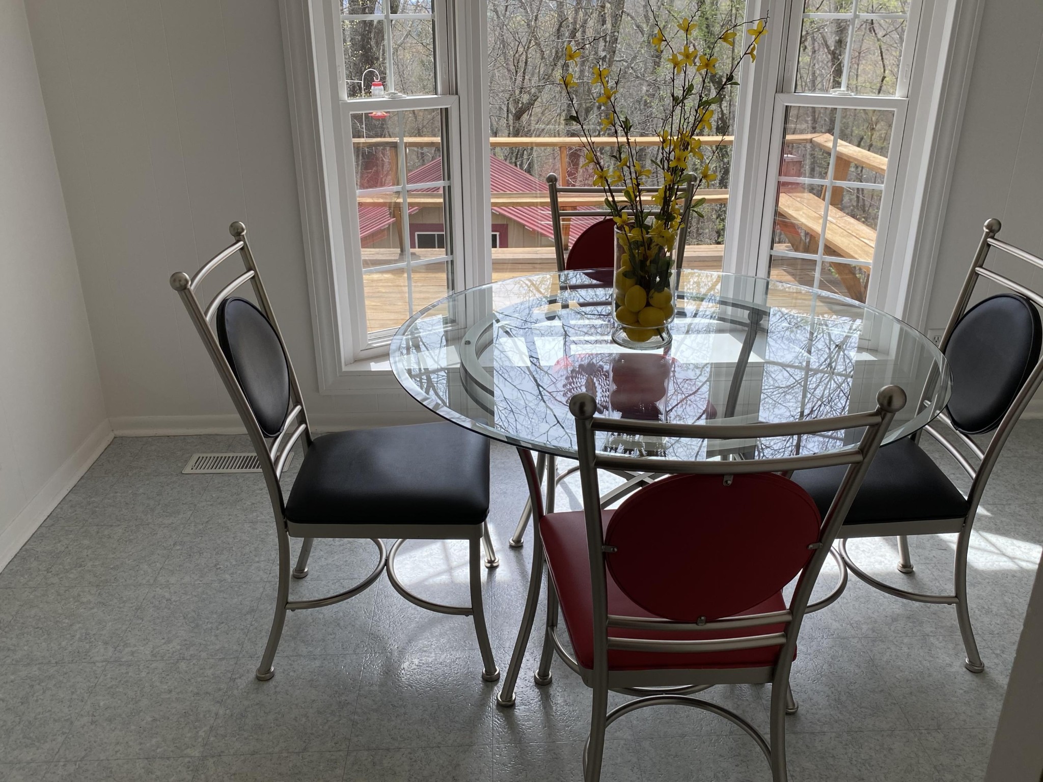 107 Morgan Road Oak Ridge, TN 37830 - Photo 11 of 24 a view of a dining room with furniture and wooden floor