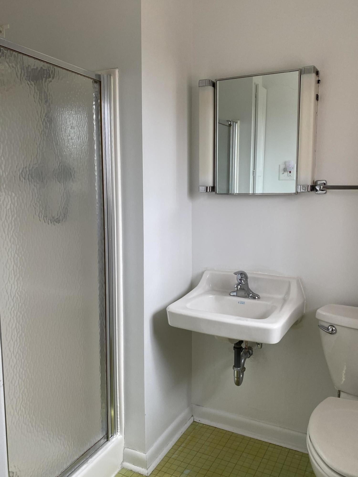 107 Morgan Road Oak Ridge, TN 37830 - Photo 16 of 24 a bathroom with a sink toilet a mirror and shower