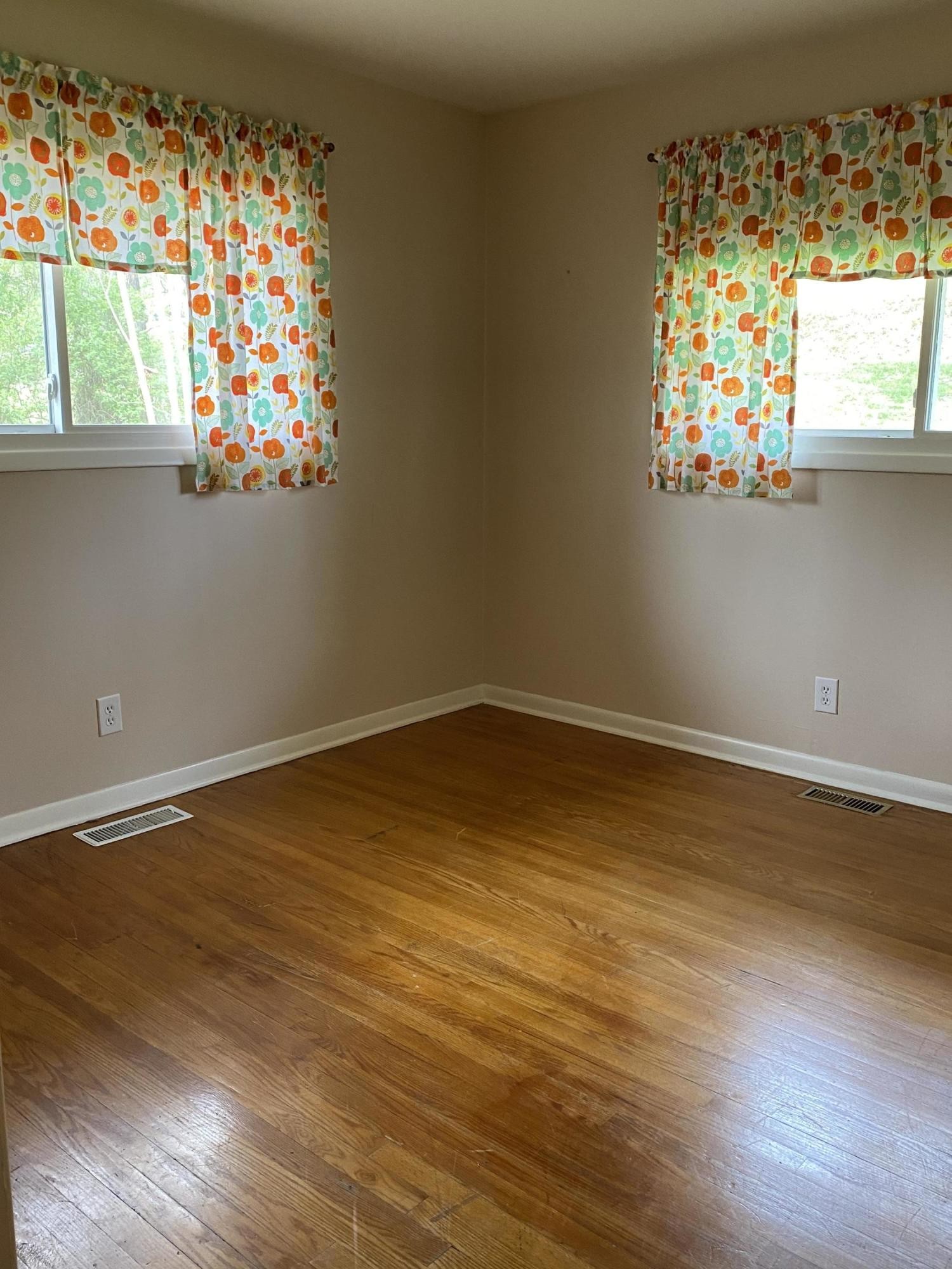 107 Morgan Road Oak Ridge, TN 37830 - Photo 19 of 24 a view of empty room with wooden floor and fan