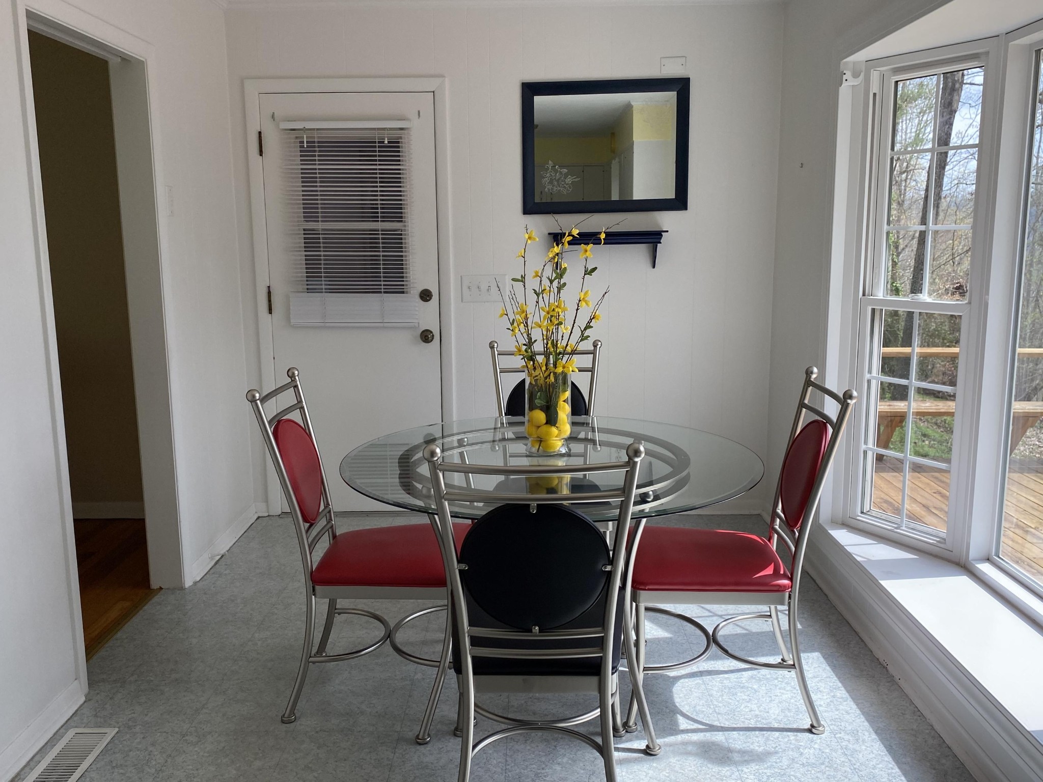 107 Morgan Road Oak Ridge, TN 37830 - Photo 10 of 24 a view of a dining room with furniture window and outside view