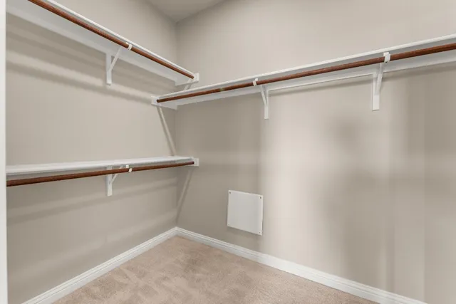 a view of an empty walk in closet