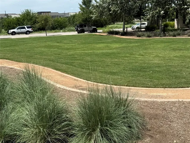 a view of a golf course with a lake