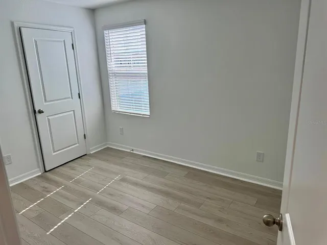 an empty room with windows