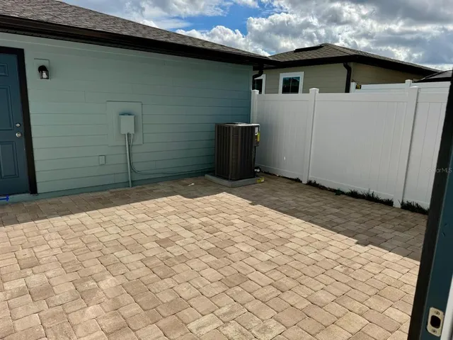a house view with a backyard space