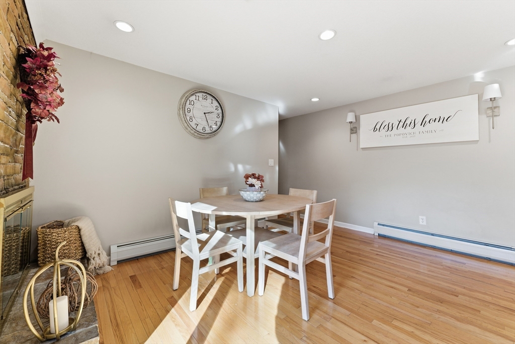 120 Inverness Lane Longmeadow, MA 01106 - Photo 21 of 42 a view of a dining room with furniture and wooden floor