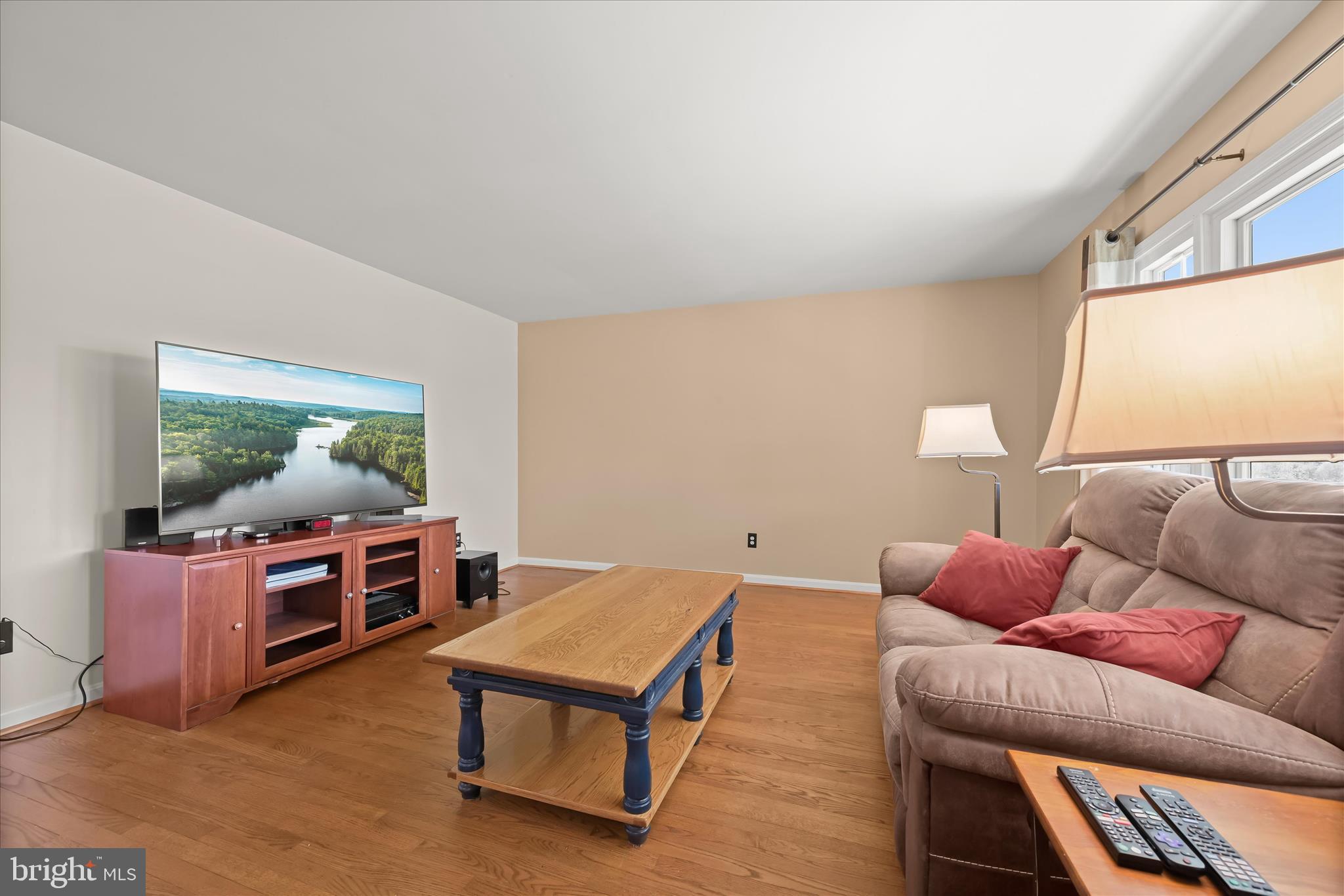 14821 Ridge Oak Drive Boyds, MD 20841 - Photo 8 of 49 a living room with furniture and a flat screen tv