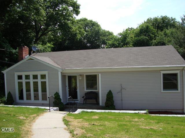 front view of house with a yard