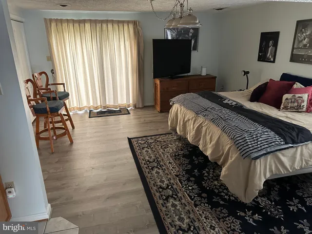 a kitchen with sink and cabinets