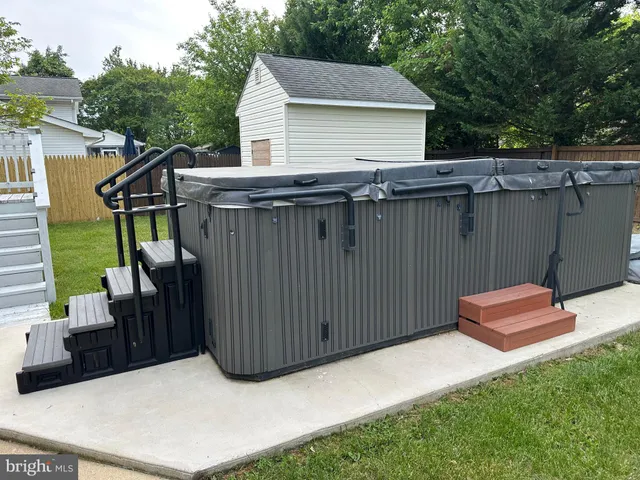a view of a livingroom with furniture and chandelier