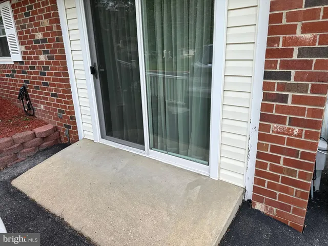 a bathroom with a shower and a toilet