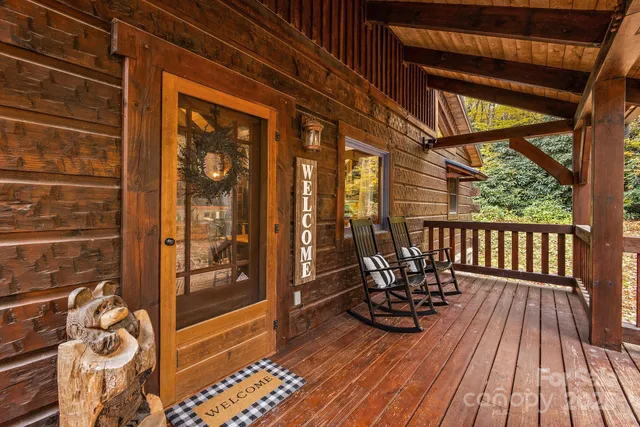 a view of balcony with wooden floor