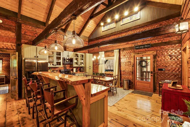 a view of a chairs and tables in the balcony