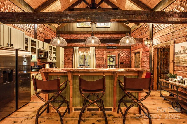 a view of a chairs and table in a patio
