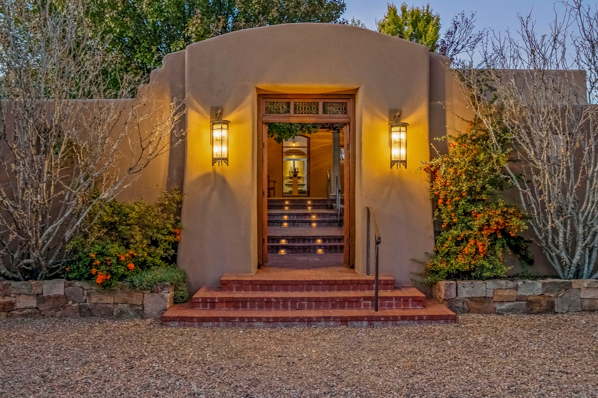 243 Double Arrow Road Santa Fe, NM 87505 - Photo 1 of 43 Entry to front courtyard and door