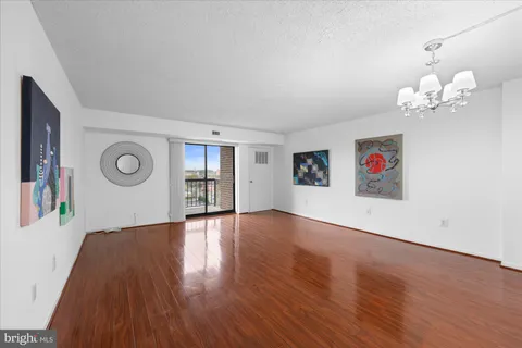a view of livingroom with hardwood floor and window